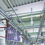 An Overhead Monorail System, Balancers and Retractors are in use in a assembly line