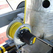 A Spring-Driven Cable Reel in use on a Container Spreader